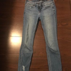 Skinny Jeans with rips at the bottom